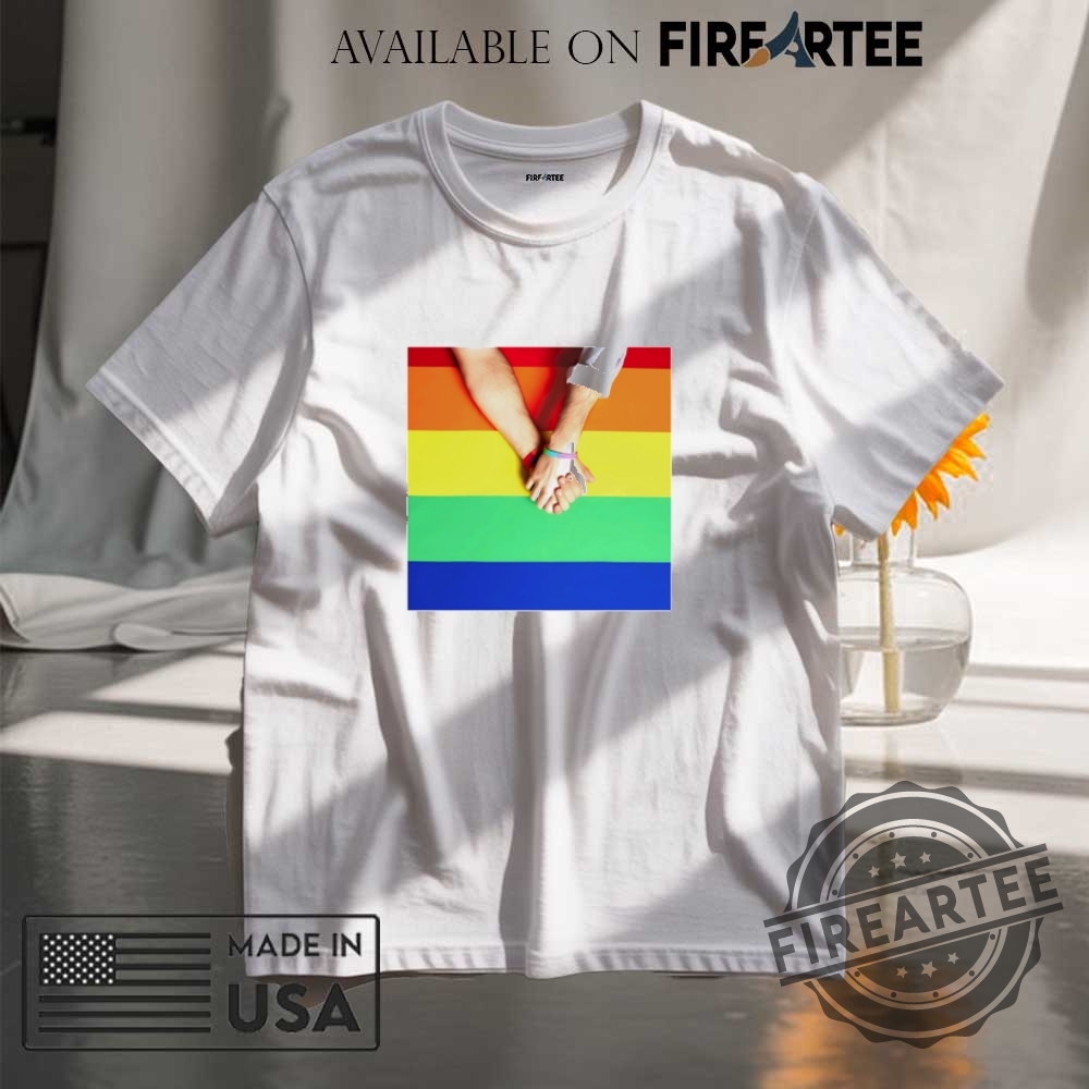 "Top Anti-Trump and Christian Flags: Unique Protest and Faith Statements" 21 Holding Onto Pride Shirt